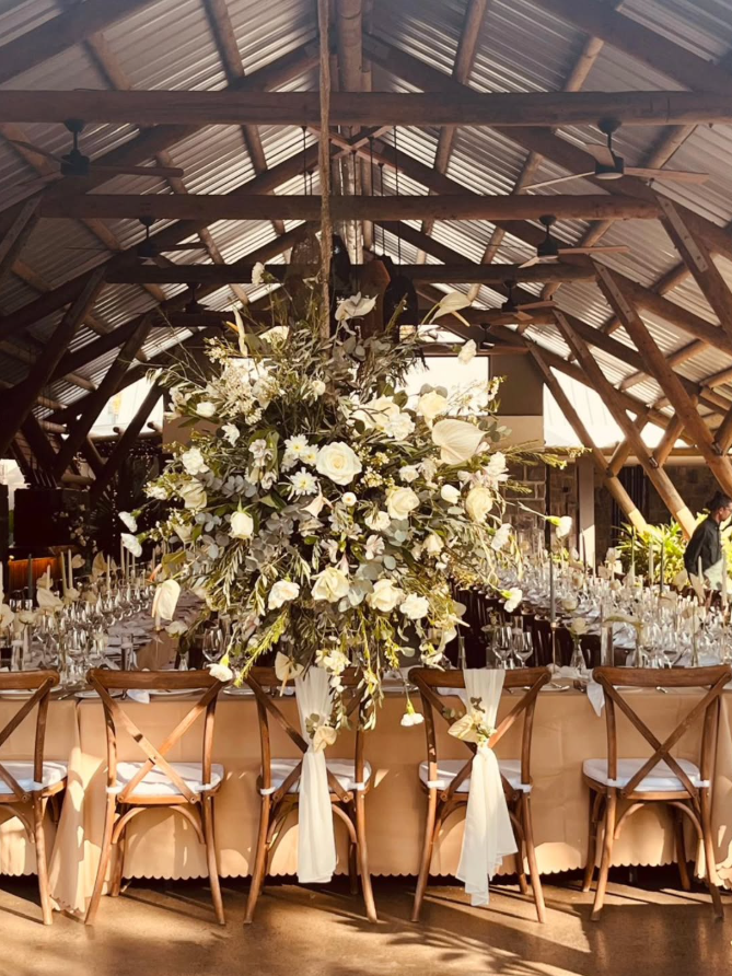 Floral centrepiece in the reception pavilion